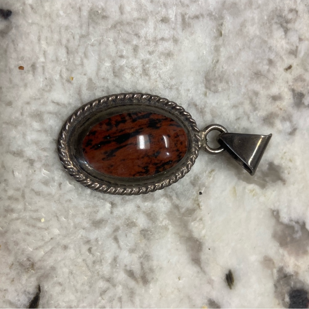 Elegant Silver and Brown Pendant